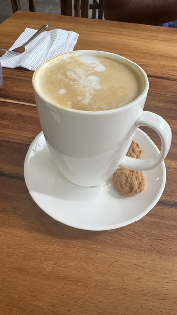 Enjoy a cup of hot latte coffee